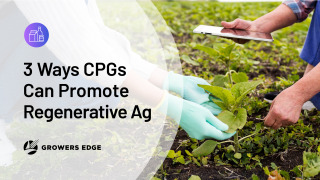Closeup of two pairs of hands. One is holding a plant in a field; the other is holding a tablet
