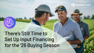 Three men in a field, one holding a clipboard to another. Text reads "There's still time to set up input financing for the '26 buying season"