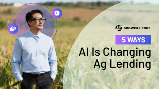 Man in business clothes standing in a field with smart glasses on. Headline reads "AI is Changing Ag Lending"