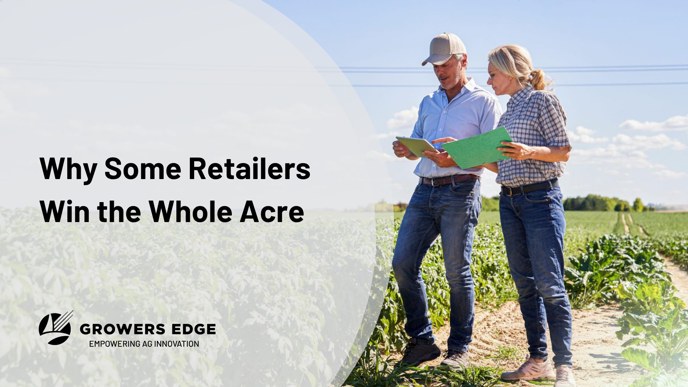 Agronomist and grower reviewing crop plans in a field during pre-season planning discussions.